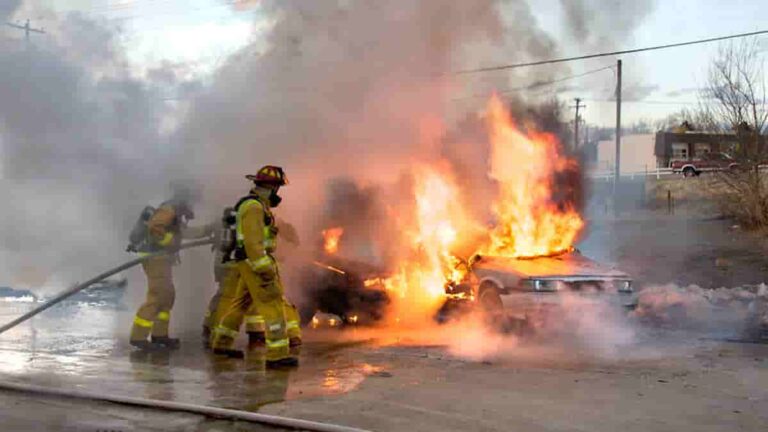 firefighters and a burning car - Focusing On Context Decreases Memory Of Negative Events